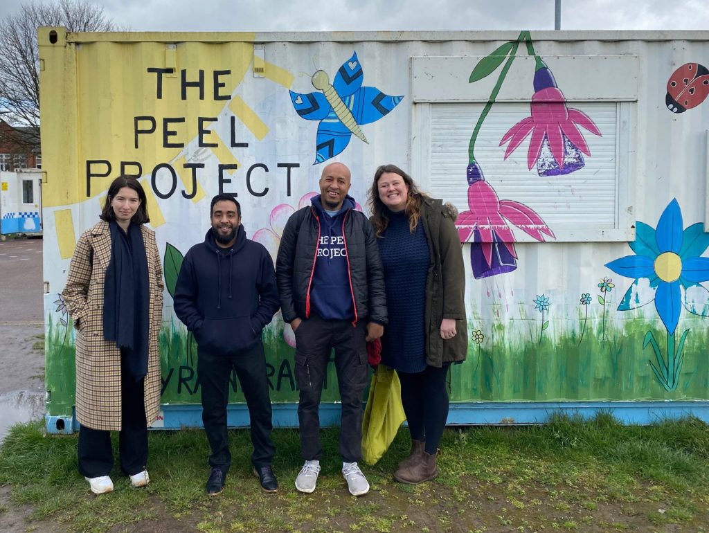 Four people standing outside The Peel Project in Hull