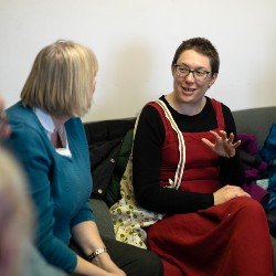 picture of a woman chatting to another woman
